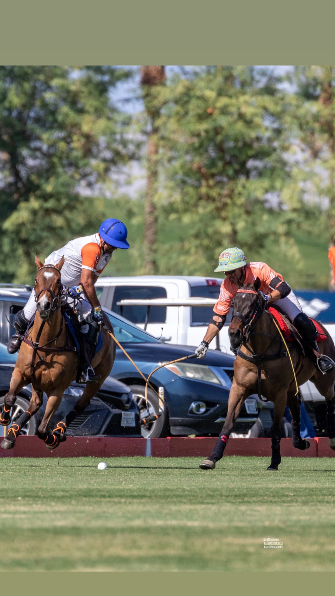 Jared Sheldon contesting the ball with another polo player